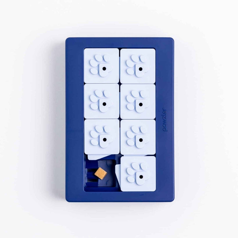 Pawzler Louvre puzzelstuk met een open vakje en een hondensnoepje